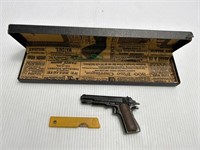 Small Colt Pellet Gun and Box Cutter