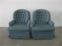 Two Upholstered Swivel Chairs