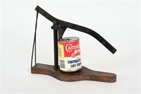 ANTIQUE CAN OPENER WITH CARNATION CAN
