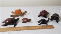 Wooden turtle figurines.