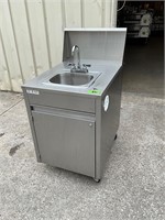 Qualserv portable sink with hot water on casters