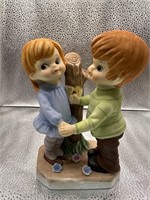 Boy and Girl Carving Initials in Tree