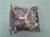 Gallon bag of costume jewelry, some new in box