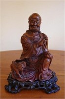 Chinese carved timber Buddha on stand