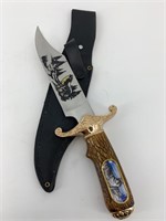 Fixed bladed knife with simulated antler handle an