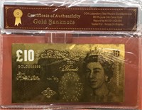 British 10 pound gold banknote