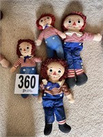 4  Raggedy Andy dolls