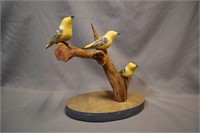 Large folk carved bird grouping by Arlie Skinner