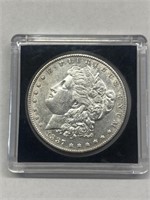 1887 Morgan silver dollar AU condition