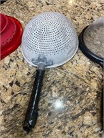 3- hand held strainers