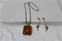 A Necklace with Amber Pendant and Earrings Suite