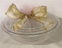 FOUR NESTING PYREX BOWLS WRAPPED