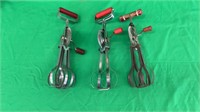 3 vintage red handled egg beaters