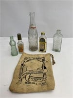 Vintage bottle and coffee sack