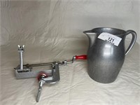Pewter pitcher and Pampered Chef apple peeler