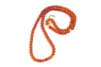 LONG STRAND NATURAL AMBER BEADED NECKLACE