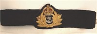 Royal Navy cap badge;