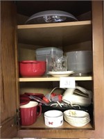 Cabinet full of assorted kitchen items