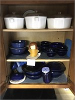 Cabinet full of assorted kitchen dishes