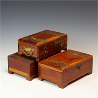 Three vintage cedar boxes