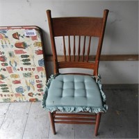 Antique oak dining chair. Star pattern on seat.