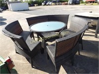 Round Patio Table with Curved Seating Sections
