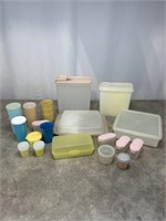 Assortment of Tupperware storage bins and cups