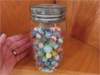 Antique Crown jar of marbles (quart size)