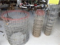 Three partial rolls of field fence