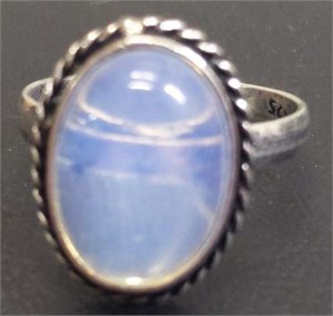 Size 7 ring with blue clear stone