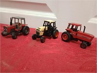 Three small tractors
