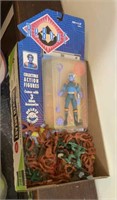 Toy soldiers and reboot action figure still