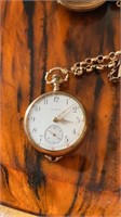 Antique Elgin gold pocket watch with cut gold