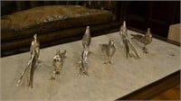 Six decorative silvered metal table birds