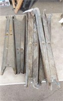 6 METAL SAW HORSES- 
4 ONE SIZE AND 2 SLIGHTLY