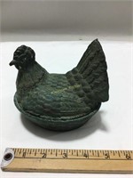 Cast metal hen figurine