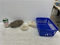 Bin of decorative rock candle holders and rocks