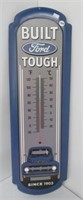 Tin Ford thermometer. Measures: 27"Hx8-3/4"W.