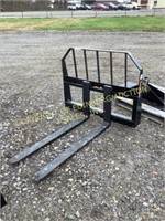 E. New Tomahawk pallet fork attachment