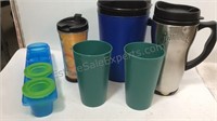Lot of plastic travel mugs and cups