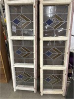 Pair of three paneled stained glass windows in