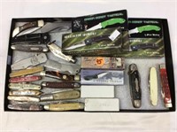 Flat of pocket knives