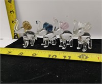 4 crystal elephants