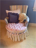 Small chair and matching loveseat with pillows