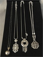 4 SILVER NECKLACES WITH PENDANTS