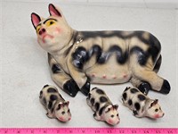 Vintage chalkware pigs