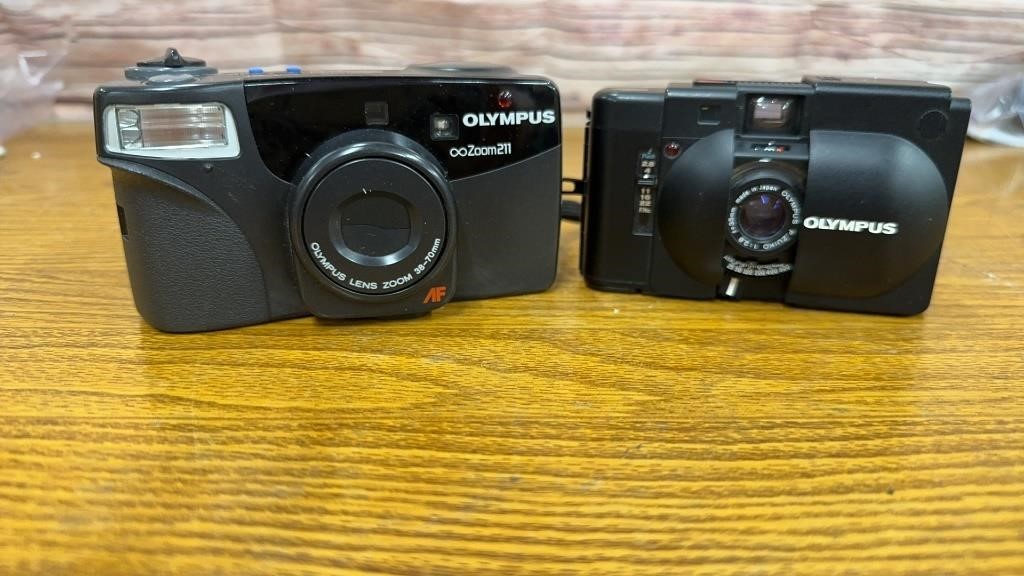 2 Olympus Cameras. Zoom 211 and XA. 35mm.