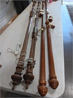 Four Curtain Rods. Two Wooden 77 inches long.