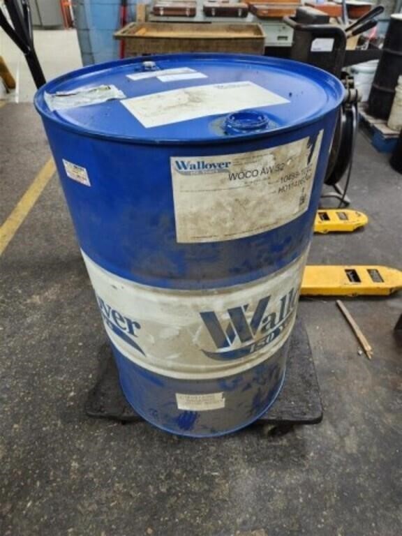 PARTIAL 55 GAL. DRUM OF USED HYDRAULIC OIL,