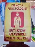 Proctologist metal sign